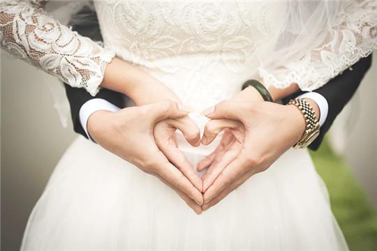 midsection-of-woman-making-heart-shape-with-hands-256737 (1).jpg